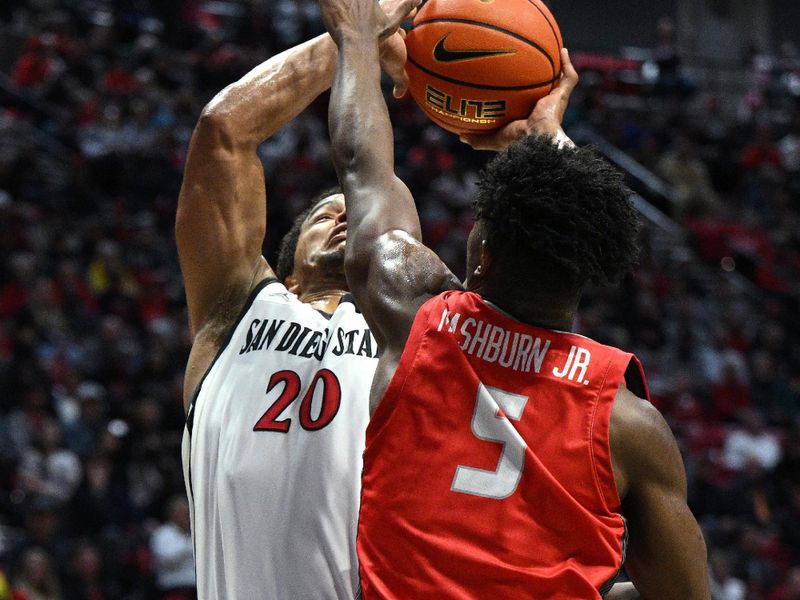 Jan 14, 2023; San Diego, California, USA; San Diego State Aztecs guard Matt Bradley (20) shoots the ball over New Mexico Lobos guard Jamal Mashburn Jr. (5) during the first half at Viejas Arena. Mandatory Credit: Orlando Ramirez-USA TODAY Sports