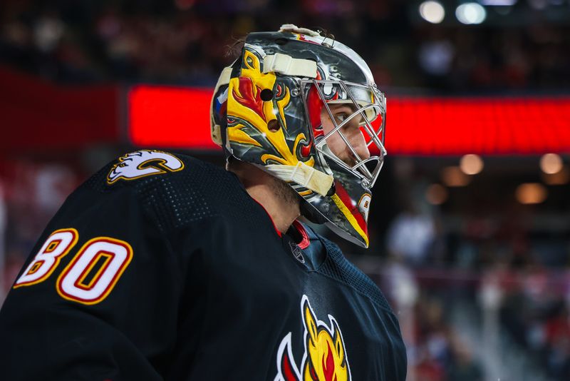 Mar 12, 2024; Calgary, Alberta, CAN; Calgary Flames goaltender Dan Vladar (80) during the first period against the Colorado Avalanche at Scotiabank Saddledome. Mandatory Credit: Sergei Belski-USA TODAY Sports