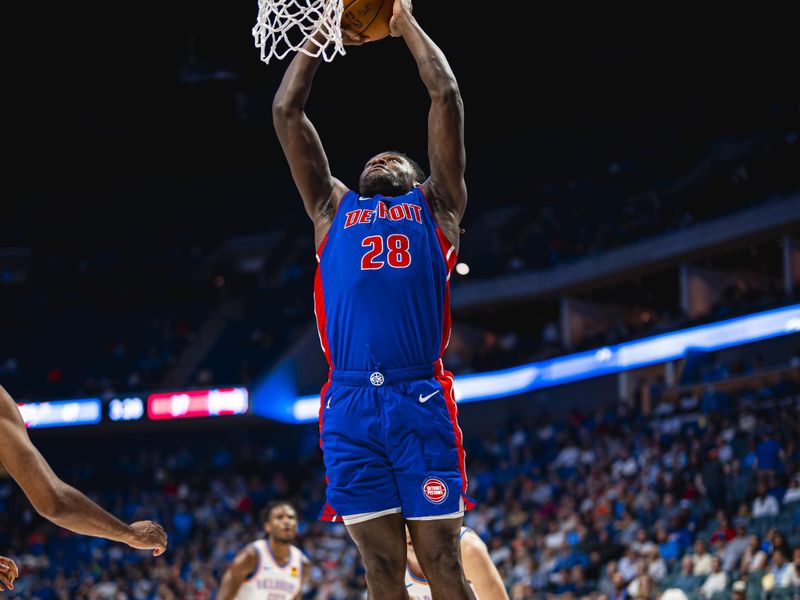 TULSA, OK - OCTOBER 19: Isaiah Stewart #28 of the Detroit Pistons dunks the ball during the game against the Oklahoma City Thunder on October 19, 2023 at the BOK Center in Tulsa, Oklahoma. NOTE TO USER: User expressly acknowledges and agrees that, by downloading and or using this photograph, User is consenting to the terms and conditions of the Getty Images License Agreement. Mandatory Copyright Notice: Copyright 2023 NBAE (Photo by Zach Beeker/NBAE via Getty Images)