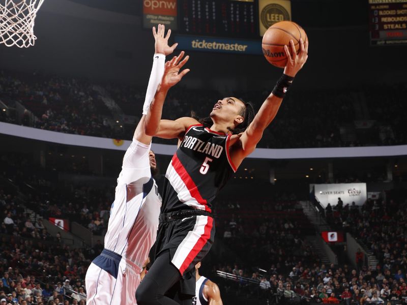 PORTLAND, OR - DECEMBER 1: Dalano Banton #5 of the Portland Trail Blazers drives to the basket during the game against the Dallas Mavericks on December 1, 2024 at the Moda Center Arena in Portland, Oregon. NOTE TO USER: User expressly acknowledges and agrees that, by downloading and or using this photograph, user is consenting to the terms and conditions of the Getty Images License Agreement. Mandatory Copyright Notice: Copyright 2024 NBAE (Photo by Cameron Browne/NBAE via Getty Images)