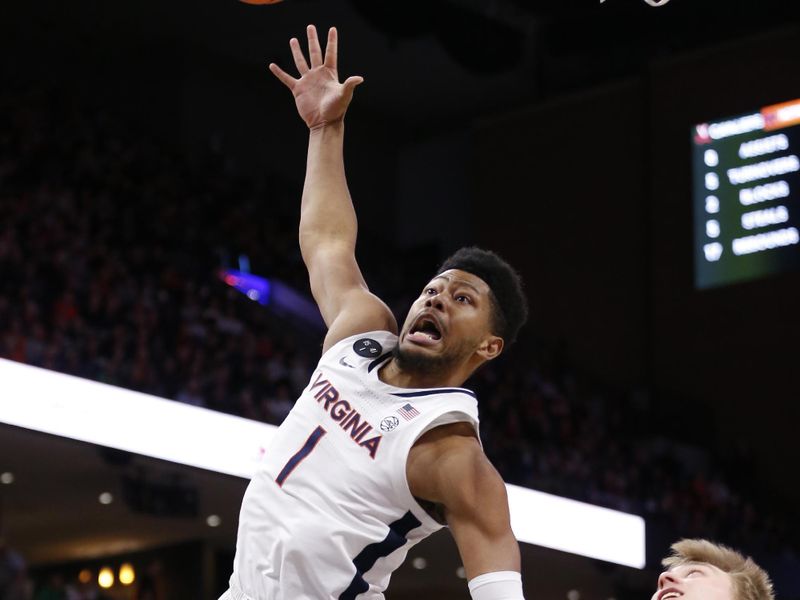 Feb 18, 2023; Charlottesville, Virginia, USA; Virginia Cavaliers forward Jayden Gardner (1) reaches for a rebound as Notre Dame Fighting Irish guard Dane Goodwin (23) defends during the second half at John Paul Jones Arena. Mandatory Credit: Amber Searls-USA TODAY Sports