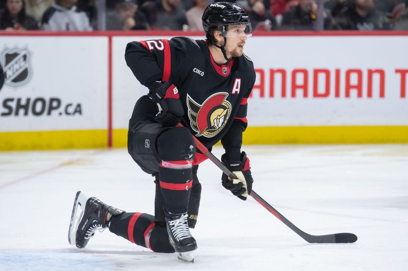 Jan 13, 2024; Ottawa, Ontario, CAN; Ottawa Senators defenseman Thomas Chabot (72) reacts after a goal by the San Jose Sharks   in the second period at the Canadian Tire Centre. Mandatory Credit: Marc DesRosiers-USA TODAY Sports