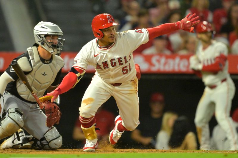 Sep 17, 2024; Anaheim, California, USA;  Los Angeles Angels right fielder Gustavo Campero (51) singles in the fifth inning against the Chicago White Sox at Angel Stadium. Mandatory Credit: Jayne Kamin-Oncea-Imagn Images