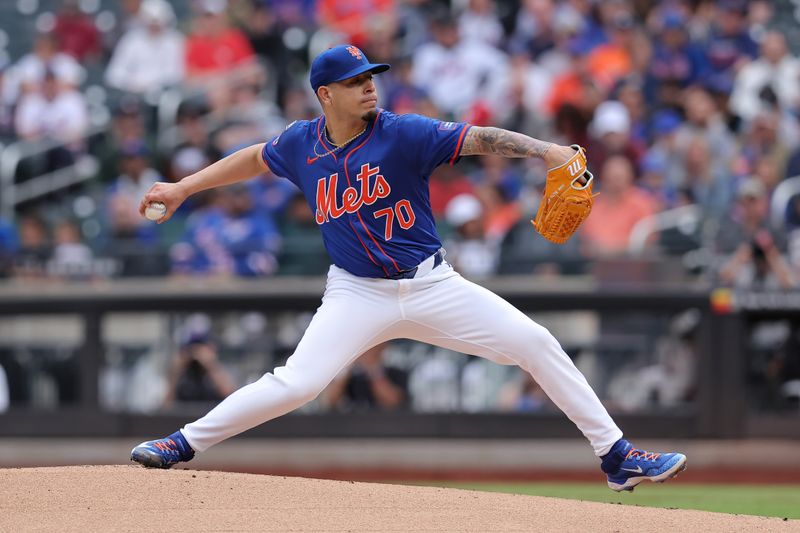 May 14, 2024; New York City, New York, USA; New York Mets starting pitcher Jose Butto (70) pitches against the Philadelphia Phillies during the first inning at Citi Field. Mandatory Credit: Brad Penner-USA TODAY Sports