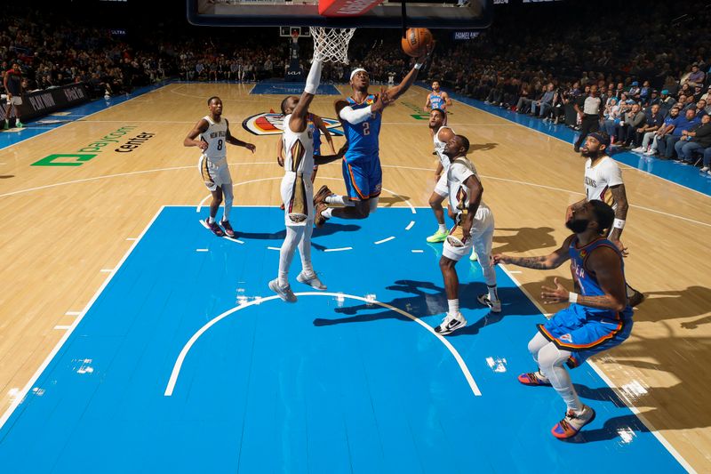 OKLAHOMA CITY, OK - NOVEMBER 13:  Shai Gilgeous-Alexander #2 of the Oklahoma City Thunder shoots the ball during the game against the New Orleans Pelicans on November 13, 2024 at Paycom Center in Oklahoma City, Oklahoma. NOTE TO USER: User expressly acknowledges and agrees that, by downloading and or using this photograph, User is consenting to the terms and conditions of the Getty Images License Agreement. Mandatory Copyright Notice: Copyright 2024 NBAE (Photo by Zach Beeker/NBAE via Getty Images)