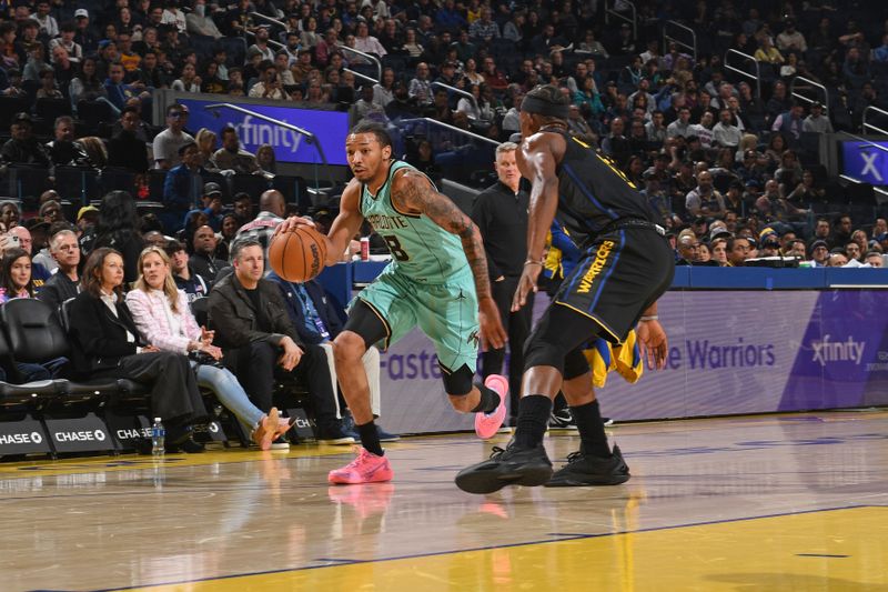 SAN FRANCISCO, CA - FEBRUARY 25: Nick Smith Jr. #8 of the Charlotte Hornets dribbles the ball during the game aGolden State Warriors on February 25, 2025 at Chase Center in San Francisco, California. NOTE TO USER: User expressly acknowledges and agrees that, by downloading and or using this photograph, user is consenting to the terms and conditions of Getty Images License Agreement. Mandatory Copyright Notice: Copyright 2025 NBAE (Photo by Noah Graham/NBAE via Getty Images)