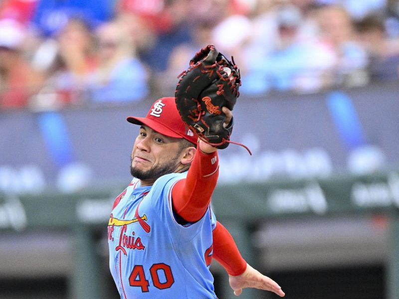 May 31, 2025; Arlington, Texas, USA; St. Louis Cardinals first baseman Willson Contreras (40) catches a throw to first base and puts out Texas Rangers center fielder Wyatt Langford (not pictured) during the ninth inning at Globe Life Field. Mandatory Credit: Jerome Miron-Imagn Images