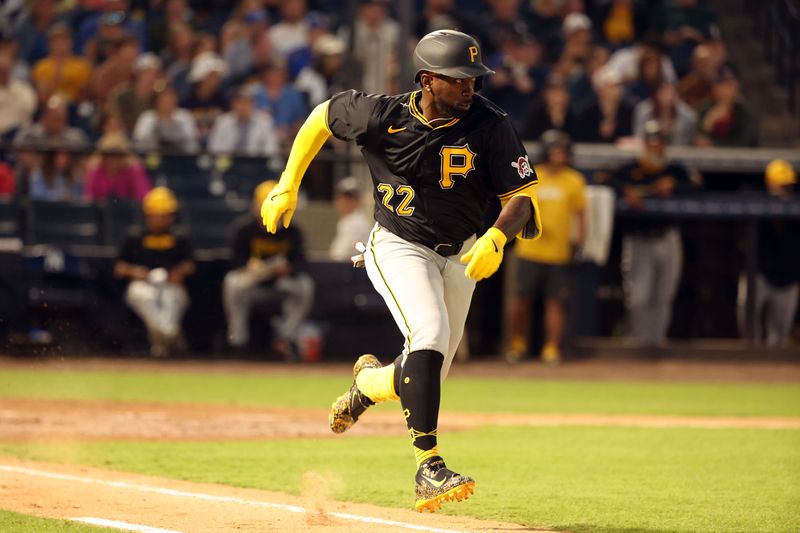 Mar 20, 2024; Tampa, Florida, USA; Pittsburgh Pirates outfielder Andrew McCutchen (22) singles during the fourth inning against the New York Yankees at George M. Steinbrenner Field. Mandatory Credit: Kim Klement Neitzel-USA TODAY Sports