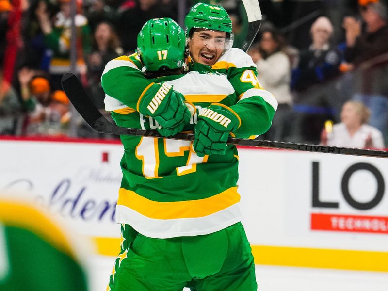 Nov 3, 2024; Saint Paul, Minnesota, USA; Minnesota Wild defenseman Jared Spurgeon (46) celebrates with left wing Marcus Foligno (17) following the game against the Toronto Maple Leafs at Xcel Energy Center. Mandatory Credit: Brace Hemmelgarn-Imagn Images