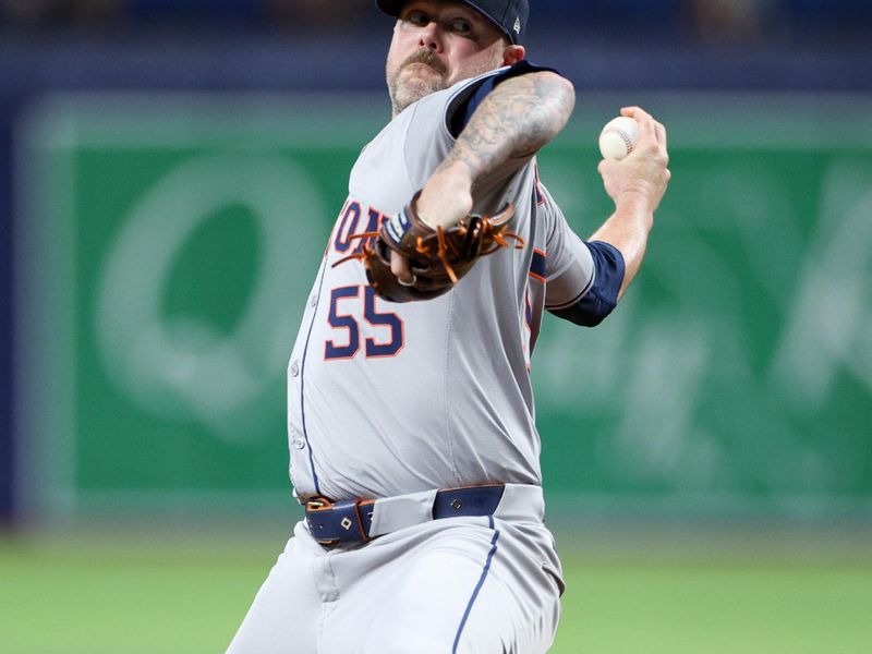Aug 13, 2024; St. Petersburg, Florida, USA; Houston Astros pitcher Ryan Pressly (55) throws a pitch against the Tampa Bay Rays in the eighth inning at Tropicana Field. Mandatory Credit: Nathan Ray Seebeck-USA TODAY Sports