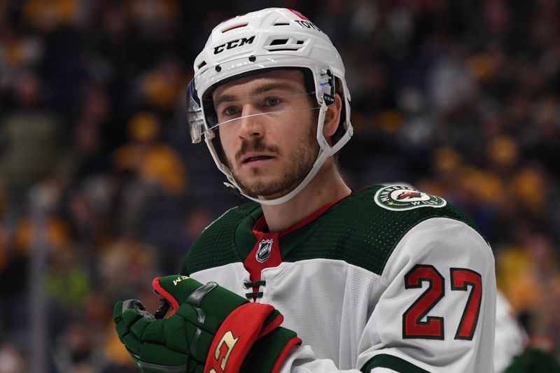 Feb 29, 2024; Nashville, Tennessee, USA; Minnesota Wild center Jacob Lucchini (27) skates in for a face off during the third period against the Nashville Predators at Bridgestone Arena. Mandatory Credit: Christopher Hanewinckel-USA TODAY Sports