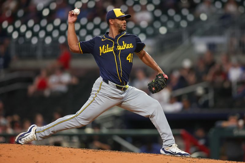 Aug 6, 2024; Atlanta, Georgia, USA; Milwaukee Brewers starting pitcher Joe Ross (41) throws against the Atlanta Braves in the ninth inning at Truist Park. Mandatory Credit: Brett Davis-USA TODAY Sports