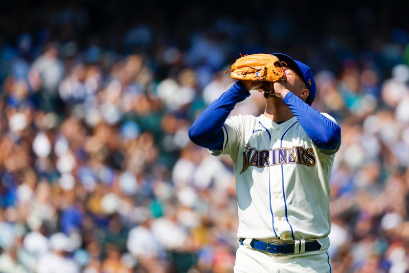 Aug 27, 2023; Seattle, Washington, USA; Seattle Mariners starting pitcher Luis Castillo (58) reacts after getting the final out of the fifth inning against the Kansas City Royals at T-Mobile Park. Mandatory Credit: Joe Nicholson-USA TODAY Sports