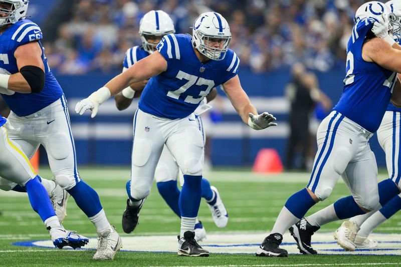 Indianapolis Colts tackle Blake Freeland (73) sprints down the field during an NFL football game against the Los Angeles Rams, Sunday, Oct. 1, 2023, in Indianapolis. (AP Photo/Zach Bolinger)