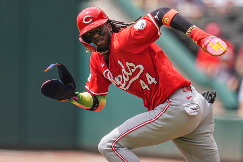 Jul 24, 2024; Cumberland, Georgia, USA; Cincinnati Reds shortstop Elly De La Cruz (44) steals second base against the Atlanta Braves during the first inning at Truist Park. Mandatory Credit: Dale Zanine-USA TODAY Sports