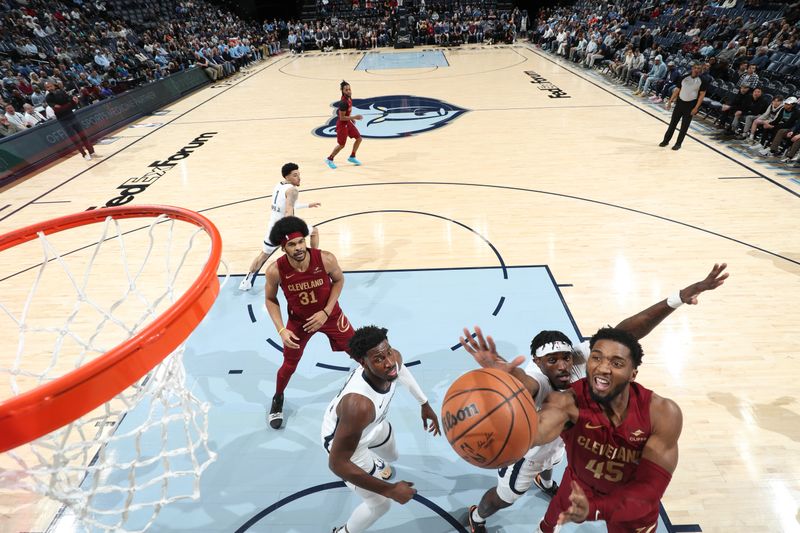 MEMPHIS, TN - FEBRUARY 1: Donovan Mitchell #45 of the Cleveland Cavaliers drives to the basket during the game  against the Memphis Grizzlies on February 1, 2024 at FedExForum in Memphis, Tennessee. NOTE TO USER: User expressly acknowledges and agrees that, by downloading and or using this photograph, User is consenting to the terms and conditions of the Getty Images License Agreement. Mandatory Copyright Notice: Copyright 2024 NBAE (Photo by Joe Murphy/NBAE via Getty Images)