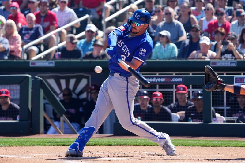 Mar 2, 2024; Goodyear, Arizona, USA; Kansas City Royals first baseman Vinnie Pasquantino (9) bats against the Cleveland Guardians during the first inning at Goodyear Ballpark. Mandatory Credit: Joe Camporeale-USA TODAY Sports