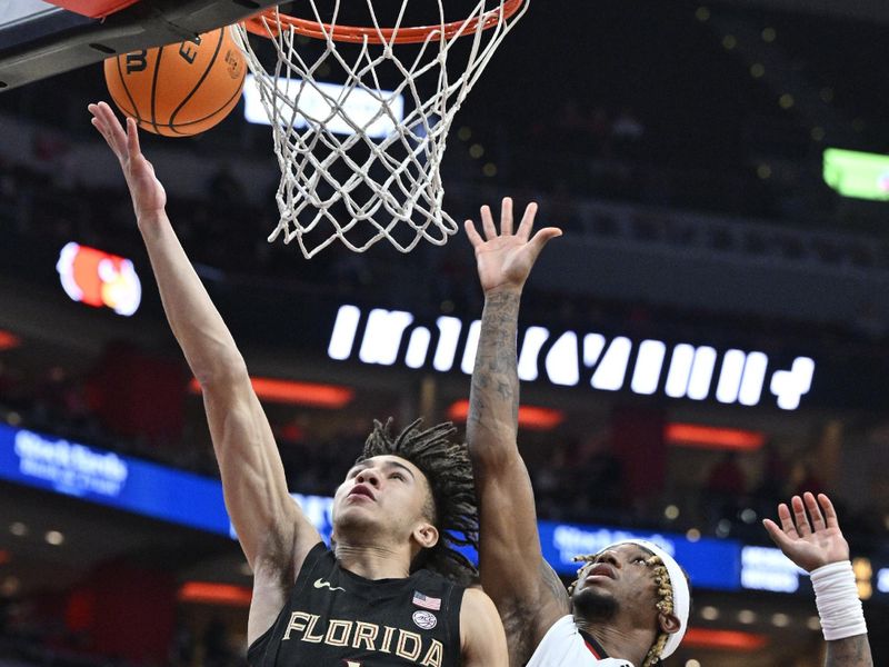 Feb 4, 2023; Louisville, Kentucky, USA;  Florida State Seminoles guard Jalen Warley (1) shoots against Louisville Cardinals guard El Ellis (3) during the first half at KFC Yum! Center. Mandatory Credit: Jamie Rhodes-USA TODAY Sports