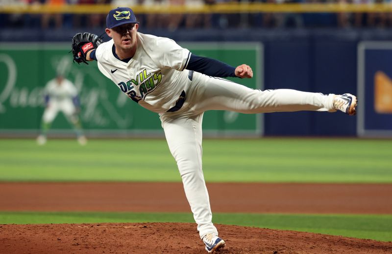 May 10, 2024; St. Petersburg, Florida, USA; Tampa Bay Rays pitcher Garrett Cleavinger (60) throws a pitch against the Tampa Bay Rays during the seventh inning  at Tropicana Field. Mandatory Credit: Kim Klement Neitzel-USA TODAY Sports