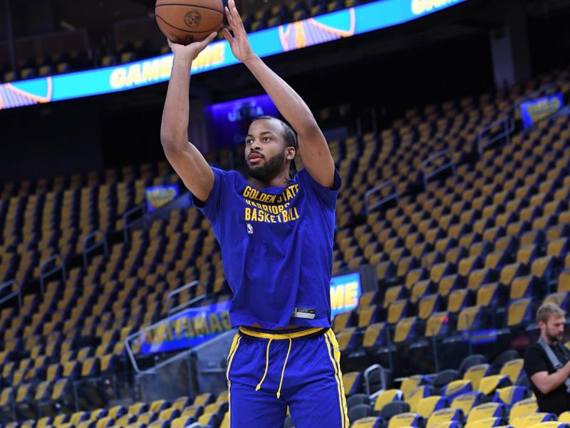 SAN FRANCISCO, CA - MARCH 18: Moses Moody #4 of the Golden State Warriors warms up before the game against the New York Knicks on MARCH 18, 2024 at Chase Center in San Francisco, California. NOTE TO USER: User expressly acknowledges and agrees that, by downloading and or using this photograph, user is consenting to the terms and conditions of Getty Images License Agreement. Mandatory Copyright Notice: Copyright 2024 NBAE (Photo by Noah Graham/NBAE via Getty Images)