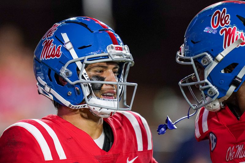 Sep 18, 2021; Oxford, Mississippi, USA;Mississippi Rebels quarterback Matt Corral (2) celebrates after scoring against Tulane Green Wave at Vaught-Hemingway Stadium. Mandatory Credit: Marvin Gentry-USA TODAY Sports