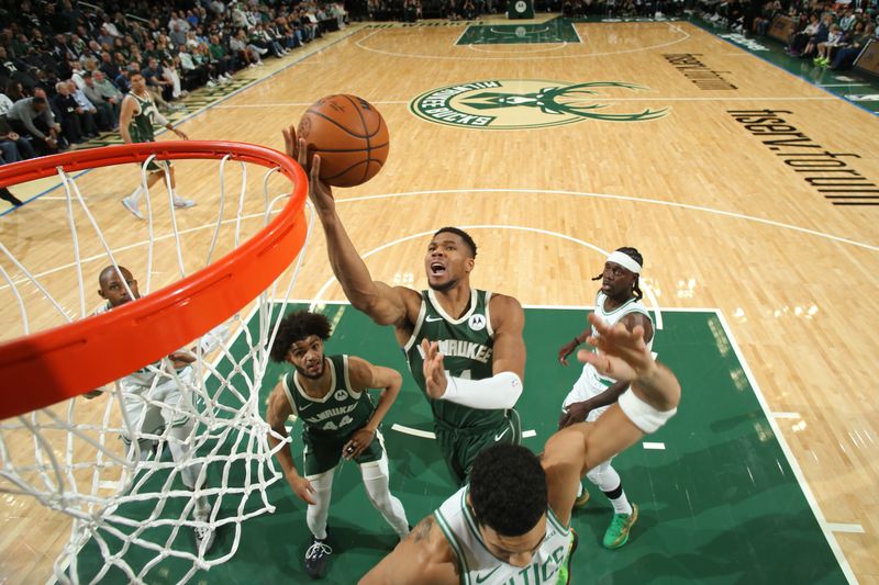 MILWAUKEE, WI - NOVEMBER 10: Giannis Antetokounmpo #34 of the Milwaukee Bucks drives to the basket during the game against the Boston Celtics on November 10, 2024 at the Fiserv Forum Center in Milwaukee, Wisconsin. NOTE TO USER: User expressly acknowledges and agrees that, by downloading and or using this Photograph, user is consenting to the terms and conditions of the Getty Images License Agreement. Mandatory Copyright Notice: Copyright 2024 NBAE (Photo by Gary Dineen/NBAE via Getty Images).