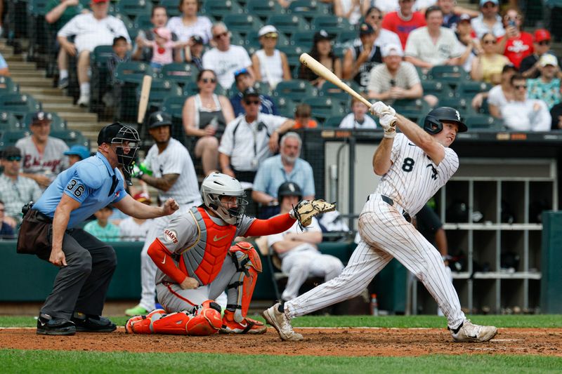 Jun 29, 2025; Chicago, Illinois, USA; Chicago White Sox catcher Kyle Teel (8) hits a two-run double against the San Francisco Giants during the seventh inning at Rate Field. Mandatory Credit: Kamil Krzaczynski-Imagn Images