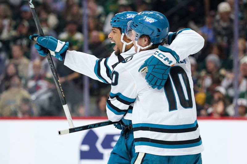 Oct 26, 2025; Saint Paul, Minnesota, USA; San Jose Sharks right wing Ryan Reaves (75) celebrates his goal with center Ty Dellandrea (10) during the second period against the Minnesota Wild at Grand Casino Arena. Mandatory Credit: Matt Krohn-Imagn Images
