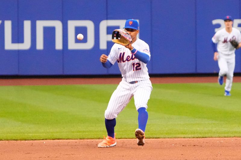 Jul 16, 2023; New York City, New York, USA; New York Mets shortstop Francisco Lindor (12) fields a ground ball hit by Los Angeles Dodgers shortstop Miguel Rojas (not pictured) during the fifth inning at Citi Field. Mandatory Credit: Gregory Fisher-USA TODAY Sports