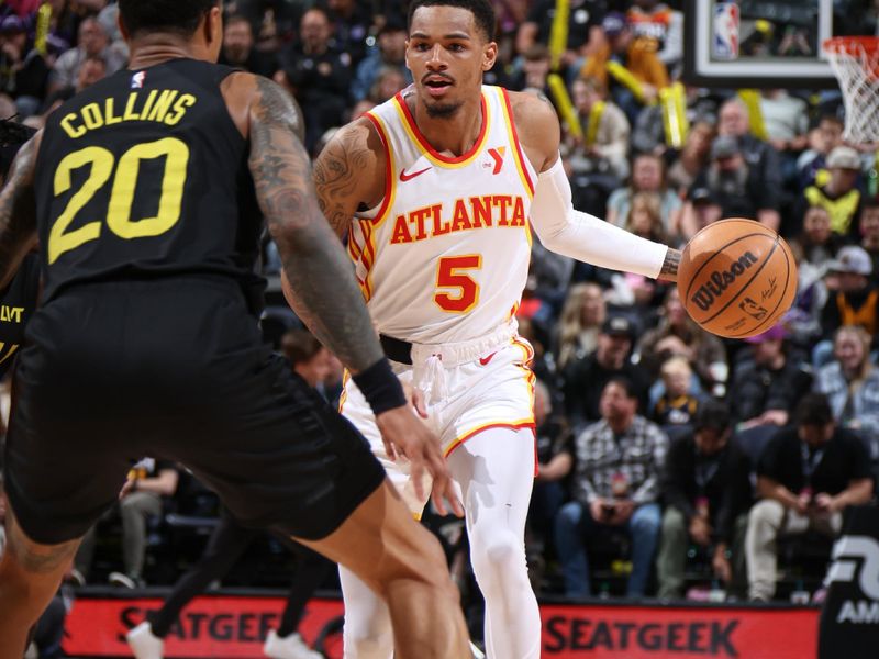 SALT LAKE CITY, UT - MARCH 15:  Dejounte Murray #5 of the Atlanta Hawks handles the ball during the game  on March 15, 2024 at Delta Center in Salt Lake City, Utah. NOTE TO USER: User expressly acknowledges and agrees that, by downloading and or using this Photograph, User is consenting to the terms and conditions of the Getty Images License Agreement. Mandatory Copyright Notice: Copyright 2024 NBAE (Photo by Melissa Majchrzak/NBAE via Getty Images)