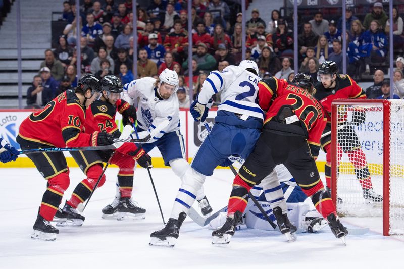 Mar 21, 2026; Ottawa, Ontario, CAN; Toronto Maple Leafs goalie Joseph Woll (60) makes a save on a shot from Ottawa Senators center Dylan Cozens (24) in the first period at the Canadian Tire Centre. Mandatory Credit: Marc DesRosiers-IMAGN Images