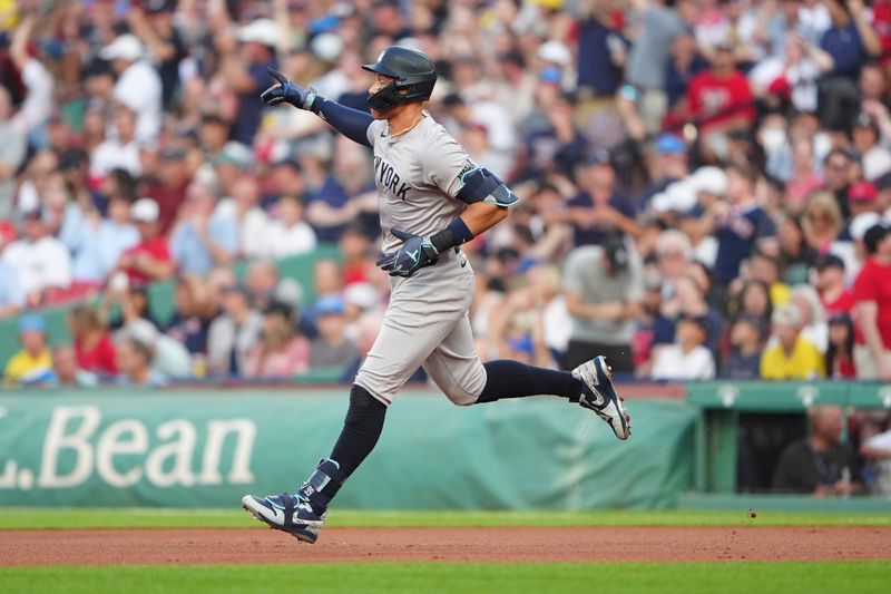 Jul 27, 2024; Boston, Massachusetts, USA; New York Yankees designated hitter Aaron Judge (99) rounds the bases after hitting a home run against the Boston Red Sox during the first inning at Fenway Park. Mandatory Credit: Gregory Fisher-USA TODAY Sports