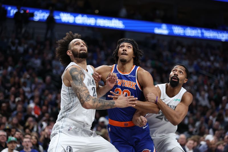 DALLAS, TX - NOVEMBER 27: Dereck Lively II #2 of the Dallas Mavericks, Jericho Sims #20 of the New York Knicks and Spencer Dinwiddie #26 of the Dallas Mavericks boxes out during the game  during a regular season game on November 27, 2024 at dalAmerican Airlines Center in Dallas, Texas. NOTE TO USER: User expressly acknowledges and agrees that, by downloading and or using this photograph, User is consenting to the terms and conditions of the Getty Images License Agreement. Mandatory Copyright Notice: Copyright 2024 NBAE (Photo by Tim Heitman/NBAE via Getty Images)