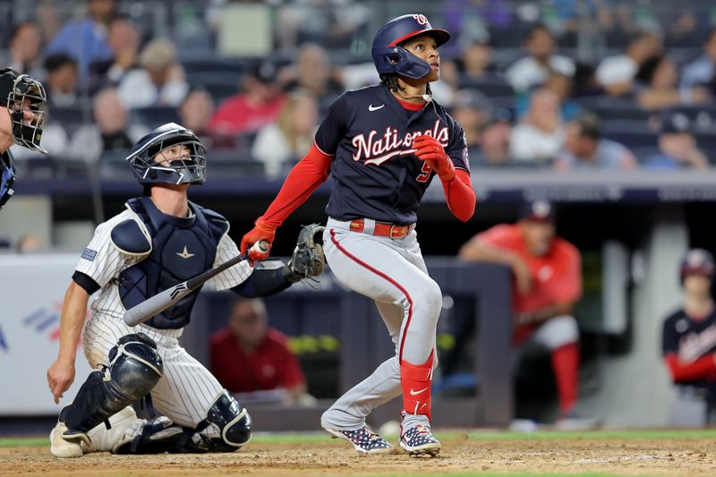 Aug 22, 2023; Bronx, New York, USA; Washington Nationals shortstop CJ Abrams (5) follows through on a solo home run against the New York Yankees during the eighth inning at Yankee Stadium. Mandatory Credit: Brad Penner-USA TODAY Sports