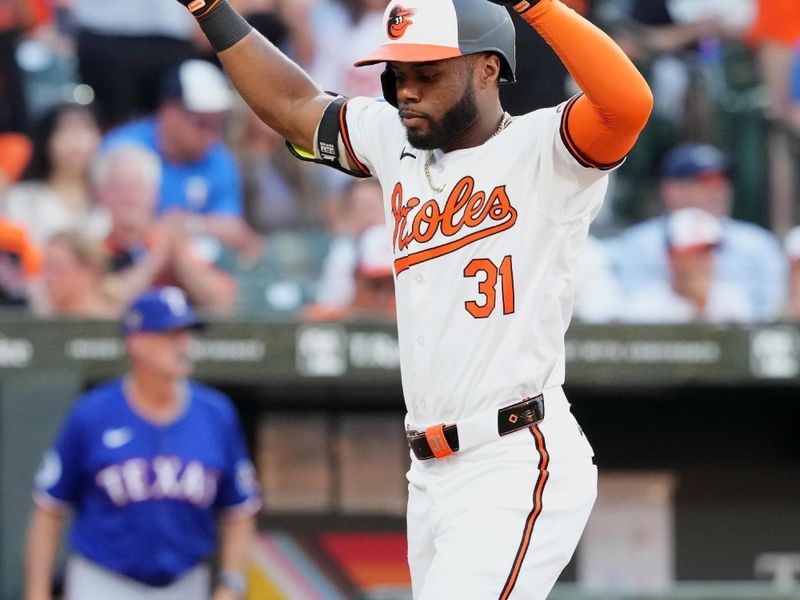 Jun 27, 2024; Baltimore, Maryland, USA; Baltimore Orioles outfielder Cedric Mullins (31) crosses home plate following his two-run home run in the fourth inning against the Texas Rangers at Oriole Park at Camden Yards. Mandatory Credit: Mitch Stringer-USA TODAY Sports