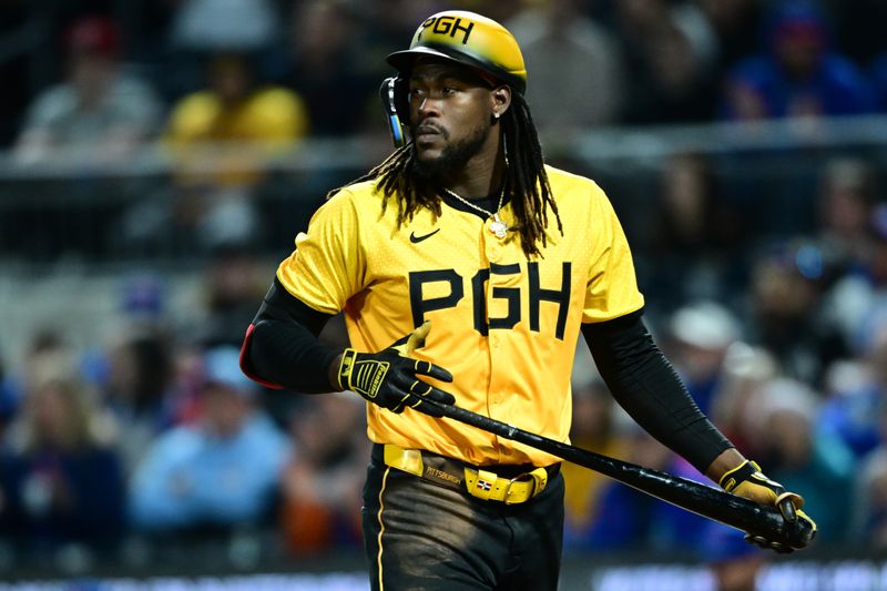 May 10, 2024; Pittsburgh, Pennsylvania, USA; Pittsburgh Pirates shortstop Oneil Cruz (15) walks to the dugout after striking out in the seventh inning against the Chicago Cubs at PNC Park. Mandatory Credit: David Dermer-USA TODAY Sports