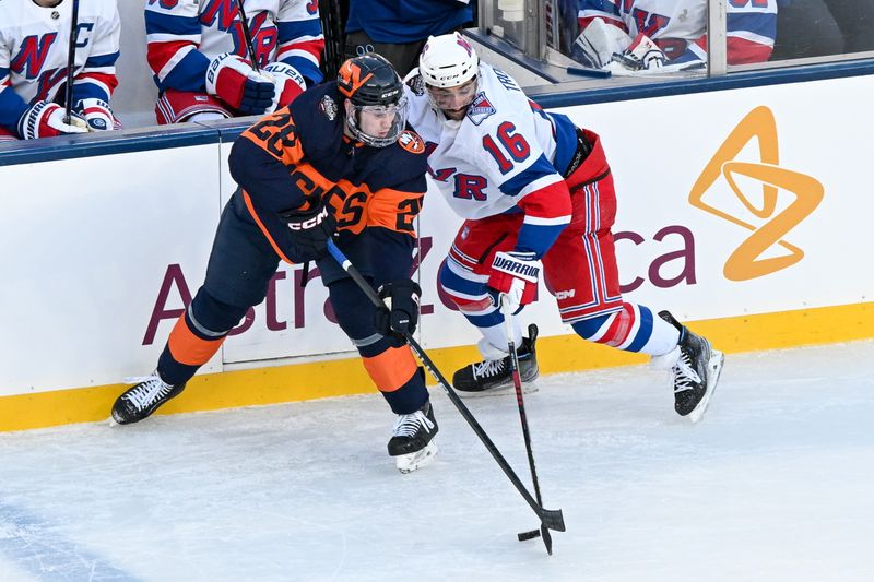 Feb 18, 2024; East Rutherford, New Jersey, USA;  New York Islanders defenseman Alexander Romanov (28) plays the puck defended by New York Rangers center Vincent Trocheck (16) during the first period in a Stadium Series ice hockey game at MetLife Stadium. Mandatory Credit: Dennis Schneidler-USA TODAY Sports