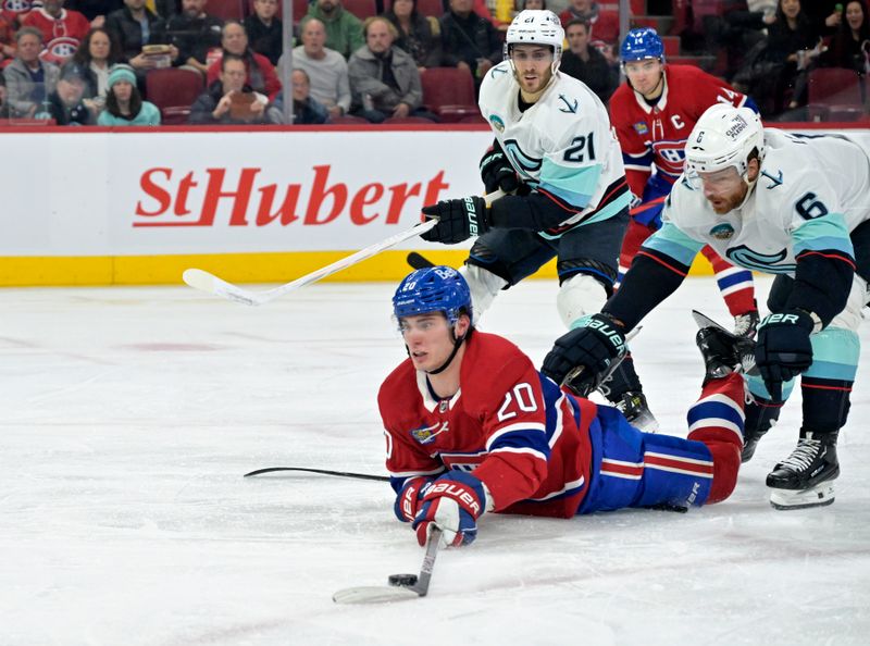 Dec 4, 2023; Montreal, Quebec, CAN; Seattle Kraken defenseman Adam Larsson (6) trips Montreal Canadiens forward Juraj Slafkovsky (20) during the second period at the Bell Centre. Mandatory Credit: Eric Bolte-USA TODAY Sports