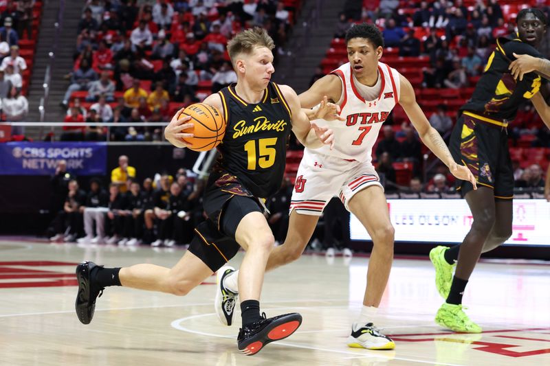 Feb 4, 2026; Salt Lake City, Utah, USA; Arizona State Sun Devils guard Noah Meeusen (15) drives to the basket against Utah Utes forward Josh Hayes (7) during the first half at Jon M. Huntsman Center. Mandatory Credit: Rob Gray-Imagn Images