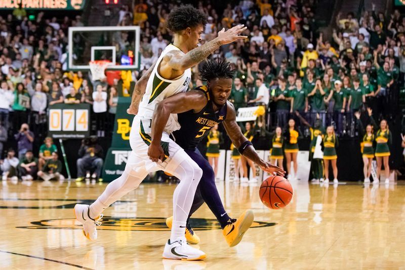 Feb 13, 2023; Waco, Texas, USA; West Virginia Mountaineers guard Joe Toussaint (5) works around Baylor Bears forward Jalen Bridges (11) during the first half at Ferrell Center. Mandatory Credit: Raymond Carlin III-USA TODAY Sports