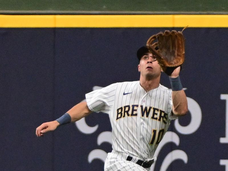 Aug 5, 2023; Milwaukee, Wisconsin, USA; Milwaukee Brewers center fielder Sal Frelick (10) catches a fly ball hit by Pittsburgh Pirates third baseman Ke'Bryan Hayes (not pictured) in the ninth inning at American Family Field. Mandatory Credit: Benny Sieu-USA TODAY Sports