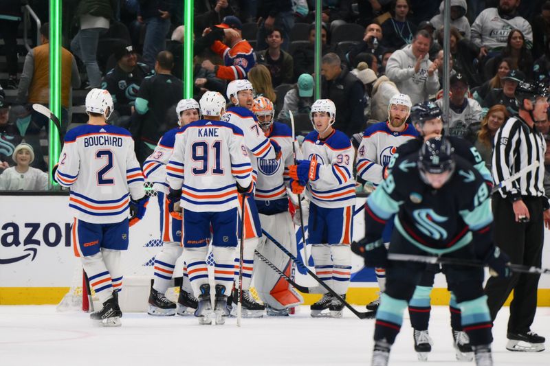 Mar 2, 2024; Seattle, Washington, USA; The Edmonton Oilers celebrate defeating the Seattle Kraken at Climate Pledge Arena. Mandatory Credit: Steven Bisig-USA TODAY Sports