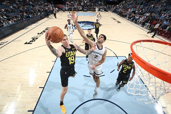 MEMPHIS, TN - NOVEMBER 29:  Luka Samanic #19 of the Utah Jazz goes to the basket during the game on November 29, 2023 at FedExForum in Memphis, Tennessee. NOTE TO USER: User expressly acknowledges and agrees that, by downloading and or using this photograph, User is consenting to the terms and conditions of the Getty Images License Agreement. Mandatory Copyright Notice: Copyright 2023 NBAE (Photo by Joe Murphy/NBAE via Getty Images)