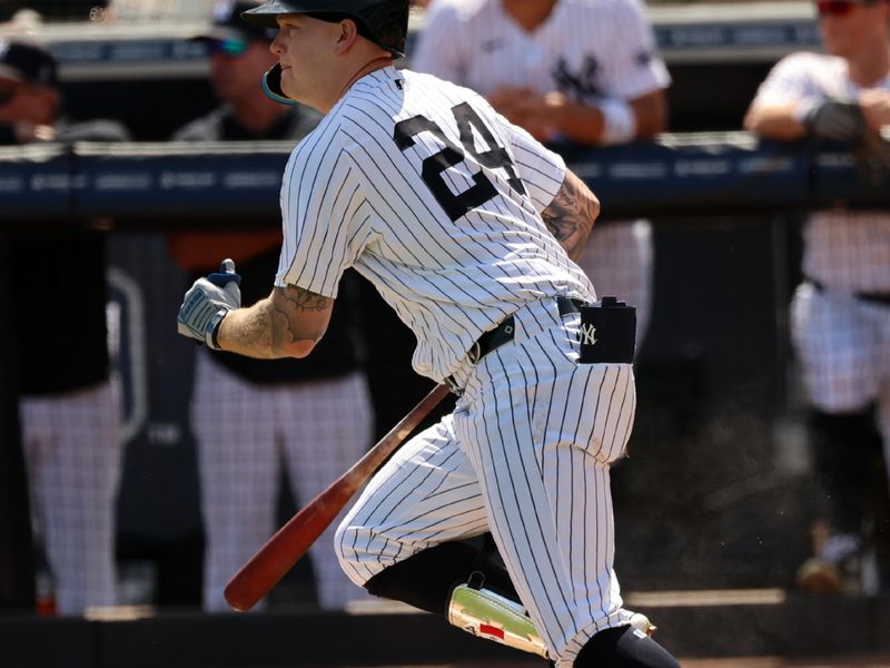 Mar 10, 2024; Tampa, Florida, USA; New York Yankees right fielder Alex Verdugo (24) hits a RBI single during the second inning against the Atlanta Braves at George M. Steinbrenner Field. Mandatory Credit: Kim Klement Neitzel-USA TODAY Sports