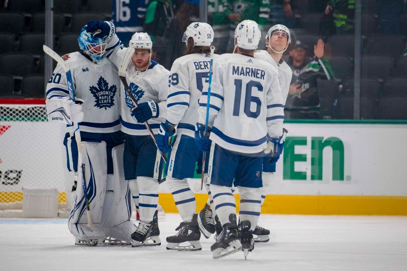 Oct 26, 2023; Dallas, Texas, USA; Toronto Maple Leafs goaltender Joseph Woll (60) and center Max Domi (11) and left wing Tyler Bertuzzi (59) and right wing Mitchell Marner (16) celebrate on the ice after their victory over the Dallas Stars at the American Airlines Center. Mandatory Credit: Jerome Miron-USA TODAY Sports