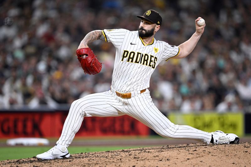 Aug 20, 2024; San Diego, California, USA; San Diego Padres relief pitcher Tanner Scott (66) pitches against the Minnesota Twins during the eighth inning at Petco Park. Mandatory Credit: Orlando Ramirez-USA TODAY Sports