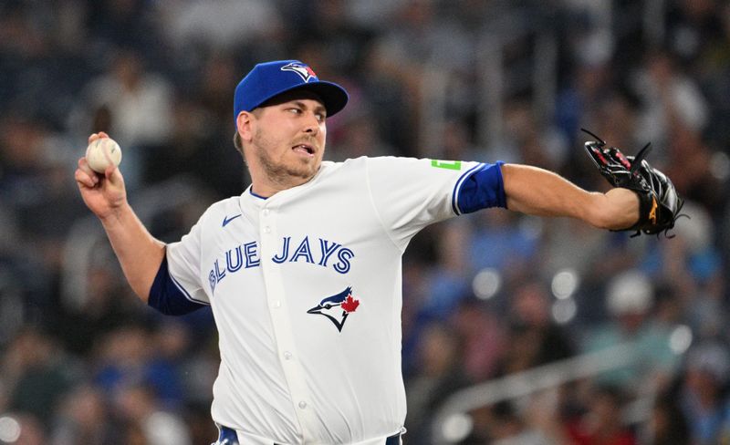 May 21, 2024; Toronto, Ontario, CAN;   Toronto Blue Jays relief pitcher Erik Swanson (50) delivers a pitch against the Chicago White Sox in the ninth inning at Rogers Centre. Mandatory Credit: Dan Hamilton-USA TODAY Sports