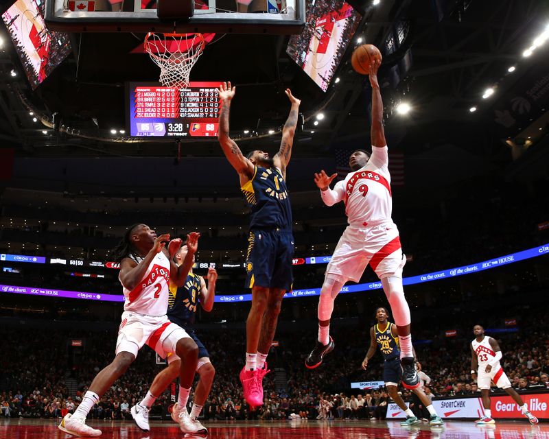 TORONTO, CANADA - NOVEMBER 18: RJ Barrett #9 of the Toronto Raptors shoots the ball during the game against the Indiana Pacers on November 18, 2024 at the Scotiabank Arena in Toronto, Ontario, Canada.  NOTE TO USER: User expressly acknowledges and agrees that, by downloading and or using this Photograph, user is consenting to the terms and conditions of the Getty Images License Agreement.  Mandatory Copyright Notice: Copyright 2024 NBAE (Photo by Vaughn Ridley/NBAE via Getty Images)