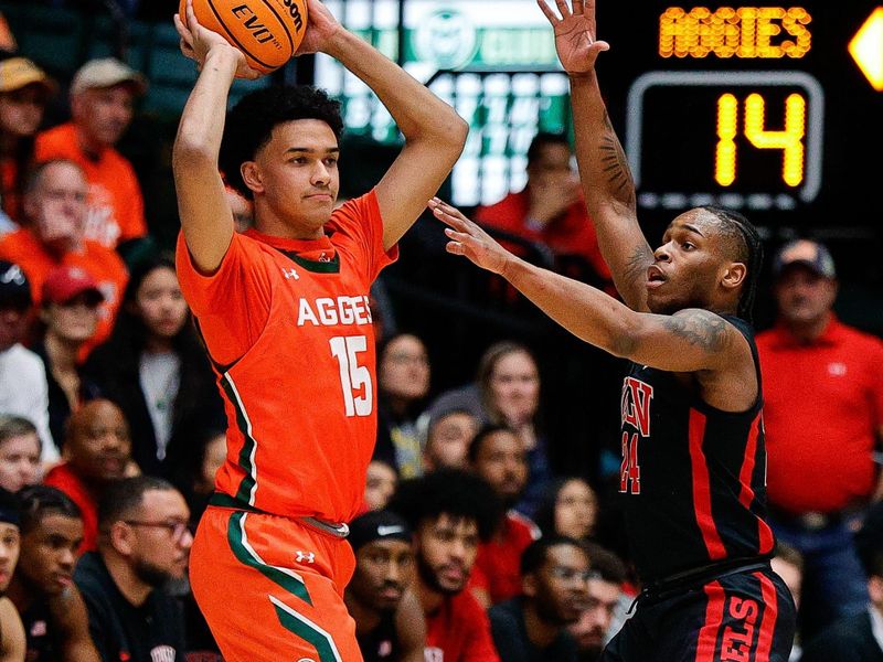 Jan 19, 2024; Fort Collins, Colorado, USA; Colorado State Rams guard Jalen Lake (15) controls the ball under pressure from UNLV Rebels guard Jackie Johnson III (24) in the first half at Moby Arena. Mandatory Credit: Isaiah J. Downing-USA TODAY Sports