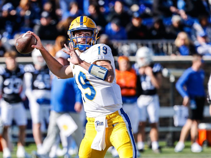 Nov 25, 2023; Durham, North Carolina, USA; Pittsburgh Panthers quarterback Nate Yarnell (19) prepares to throw the ball during the first half of the game against Duke Blue Devils at Wallace Wade Stadium. Mandatory Credit: Jaylynn Nash-USA TODAY Sports